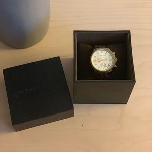 Gold Michael Kors watch.